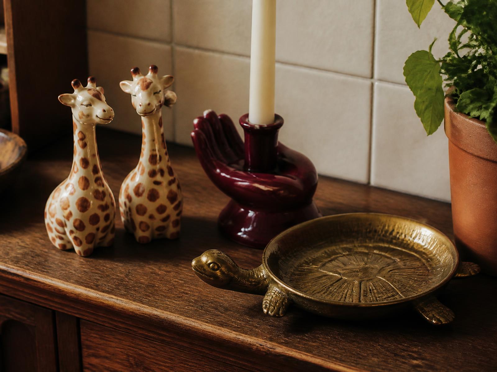 Oh Fancy objects arranged on a vintage wooden shelf